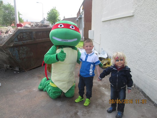 Hunter and Brayden with Raphael Ninja Turtle