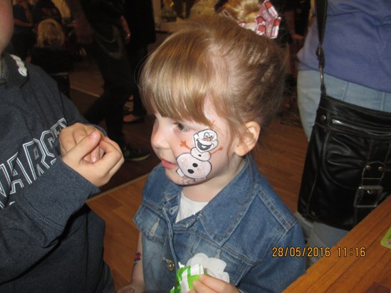Darra with her face painted