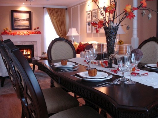 This is our dining room where we always have Thanksgiving dinner a place is set for you