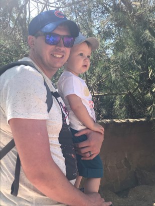 Daddy and Theo checking out the animals in the Zoo