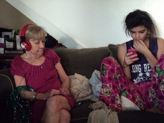Christmas morning 2011, Mom is listening to something on headphones lol