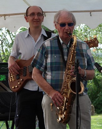 Father and son performing in 2012