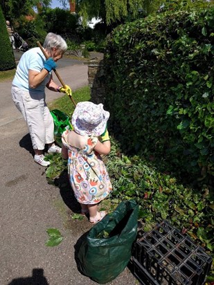 Mum & Poppy gardening