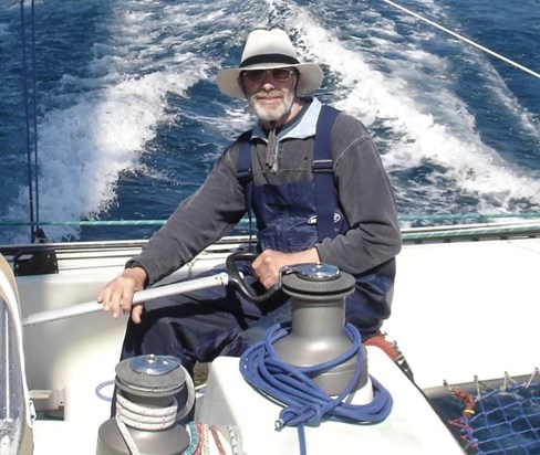 Dad helming trimaran during transatlantic crossing