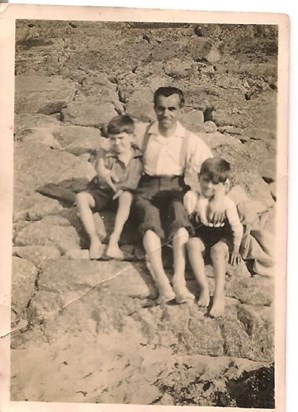 John with his dad and brother