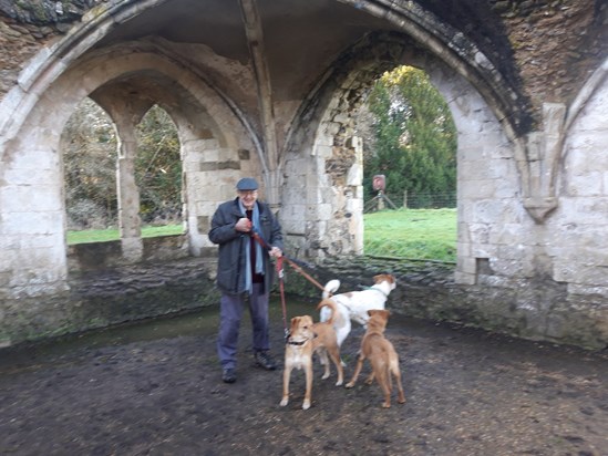 Dad walking the Maurichiens at the Abbey