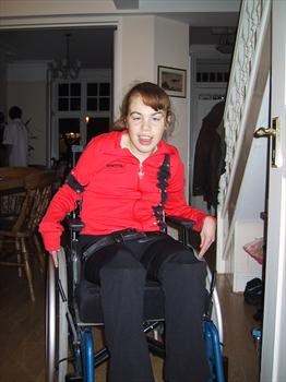 Moira wheeling herself 2003