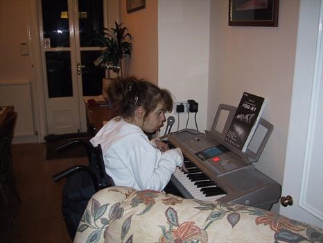 Moira playing the keyboard 2004