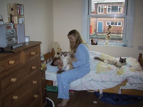My big sis, Penny with me in bed 2002