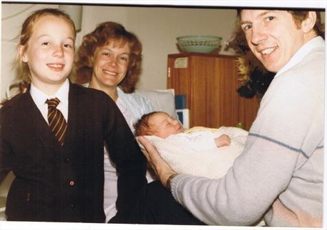 Dad holds Moira with Penny and Mum while Ian plays cameraman 15 Nov 1985