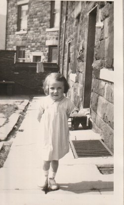 A young mum on Earl Street, Mossley