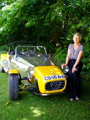 Always with a sense of humour, she and her husband John arrived in style in their little yellow car.