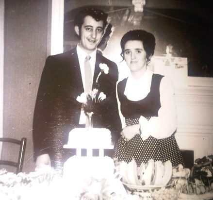 Mum & Dad cutting the cake on their wedding day 18th March 1972