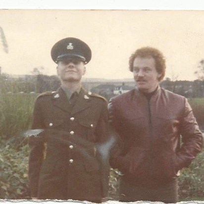 Trevor as a new recruit, with brother Paul