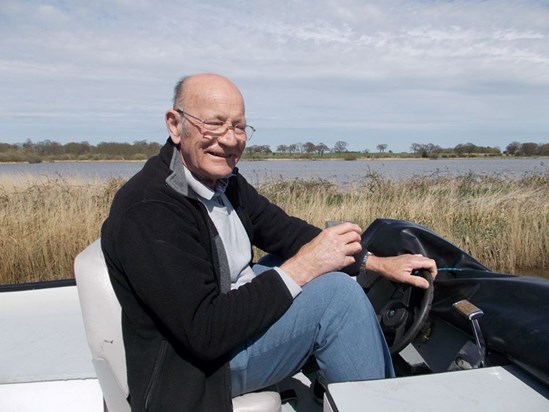 Messing about on his boat......