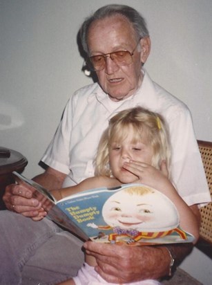 Kellie and Uncle Jim reading Humpty Dumpty