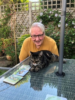 John and Toby trying out the new garden furniture, May 2022