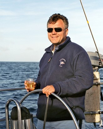 David at the helm on a Phat Buoys sailing adventure - Newfoundland 2004