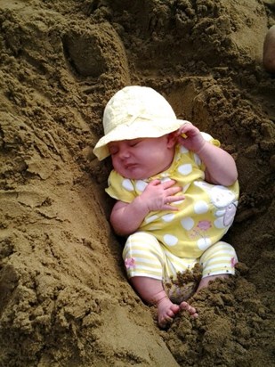 laila been buried in the sand at scarborough (she woke up and screamed for a bottle lol) xx