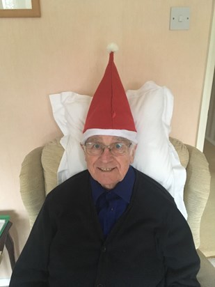 Grandpa a few christmases ago, looking like a Christmas elf