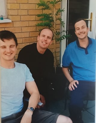 Anthony and his brothers on a bbq afternoon