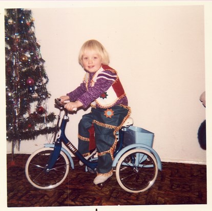 Christmas day 1973, Alan aged 3 in his cowboy outfit on his bike.  God bless you hunny xxxxx
