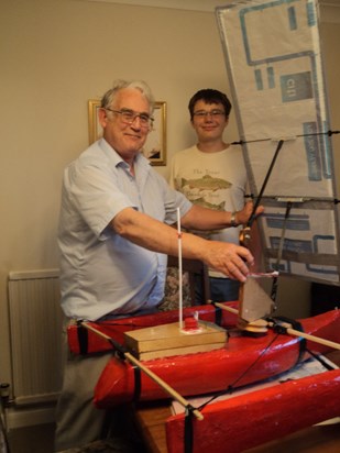 Les demonstrating his new design for a sailing rig to his great nephew, Alec Schneider. Aug, 2012