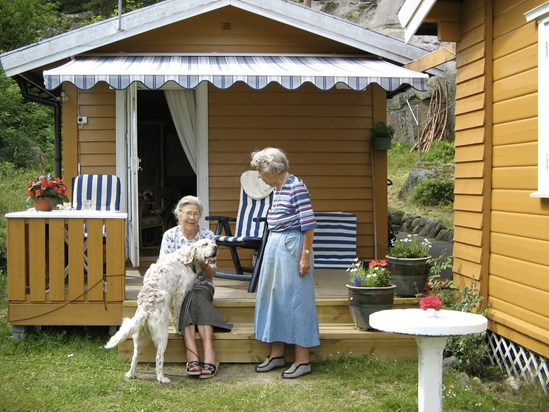 Enjoying the seaside at the summer cottage in Håkavika in 2005, with her sister Siri