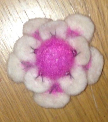 Broch made using some of  Mum's pink hair