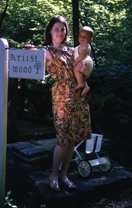 Ever elegant Mum holding a young Phil