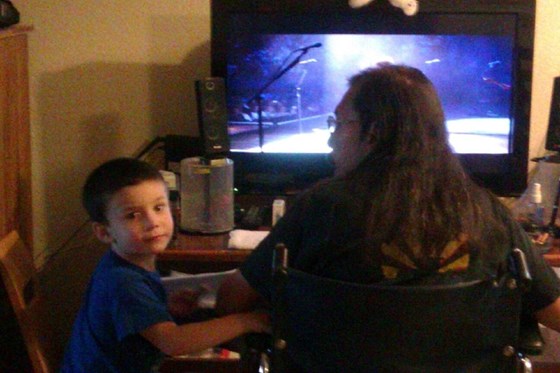 Phil and his bestest buddy, Gabriel, watching a concert.