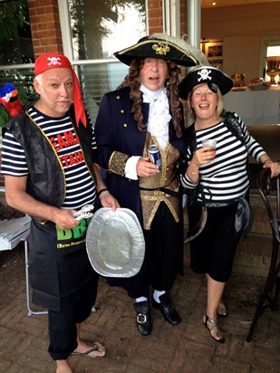 Long John Silver & Capatin Flint with their Jolly Roger!