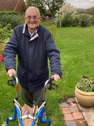 Dad taking a few steps in his beloved garden, 10 days before he died.