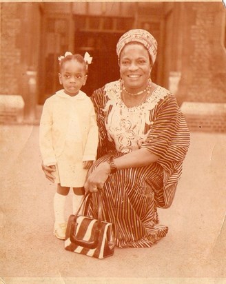 Ijeoma as a toddler with her late Mum. The baby of the family.