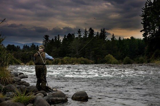 At his happiest fly fishing