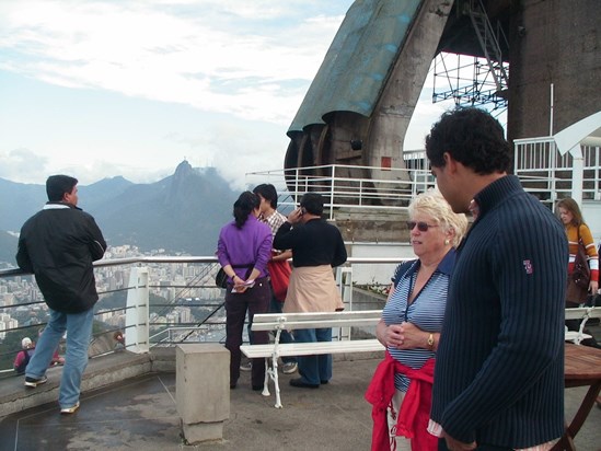 Brazil - Rio 2009. With our guide. The statue of Christ can just be seen on mountain in the distance