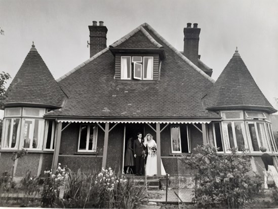 At her family home, wedding day 1955