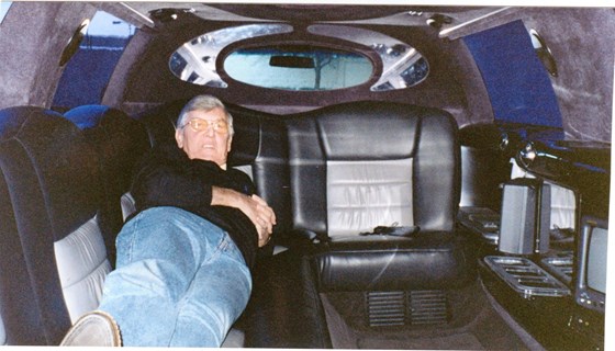 John  enjoying the stretch limo ride to the Grand Canyon
