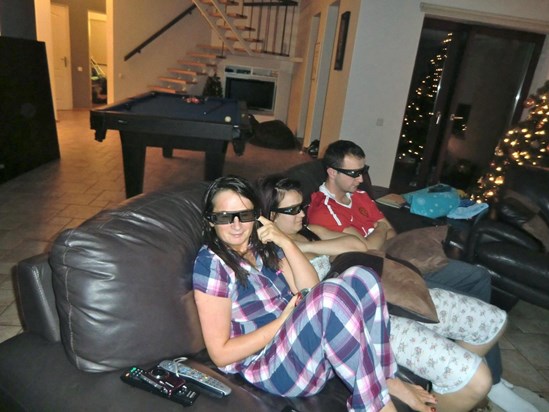 Watching 3d smurfs. Quality family time. We'll seen Michelle is in middle of us two Hee Hee