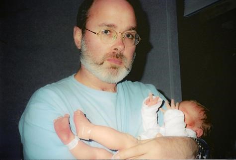 Dan holding newborn Gio, 2001