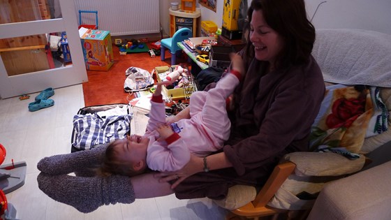 Lucie helping mummy tone her hamstrings Christmas 2011