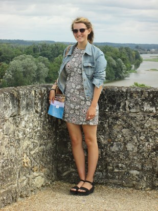 This is Alice in the Loire valley in 2013 when she and I (Katherine) went camping through France together.  I think it was probably taken at the Chateau at Amboise.  Such a happy time.