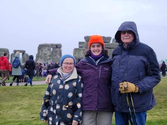 Tim, Caroline, and Ayshe at Stonehenge during the Winter Solstice celebrations of 2022. Summer Solstice is definitely a warmer event!