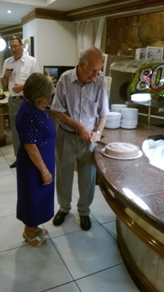 Mum and Dad cutting his 80th Birthday cake
