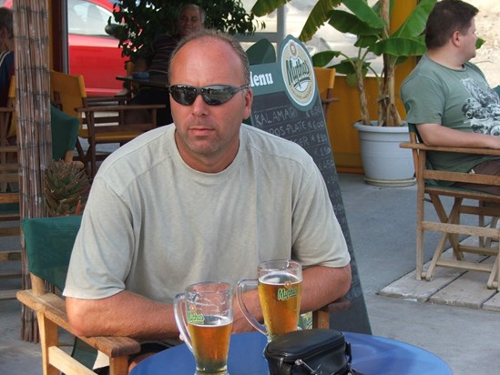 Enjoying a pint in one of Greek Islands