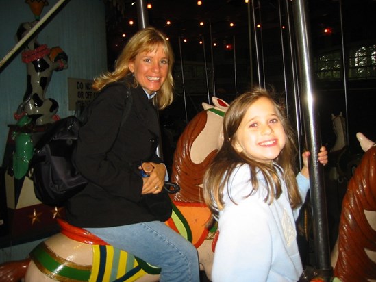 Karen and Lauren on a merry-go-round in NY