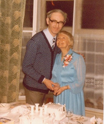 My dad sent me this photo: Roy and Jean cutting the wedding cake at Manor Road, Potters Bar