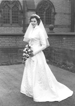 wedding dress was made by Joan's mother