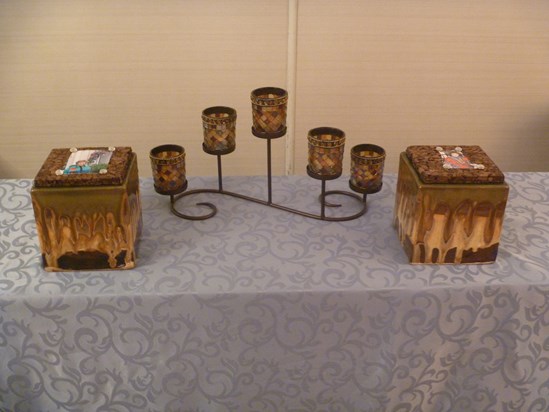 pottery holders made by a Creativity Art Show artist, transformed into beautiful, meaningful urns 