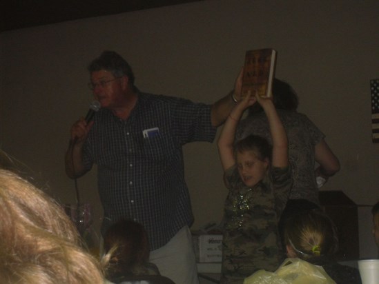 Erman Playing Auctioneer at our Reunion in 2010
